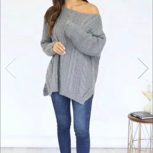 Pink Lily cable knit sweater.